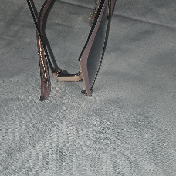 Stylish Pink and Black Sunglasses for a Bold Look - Picture 15 of 16